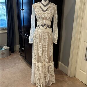 Elegant White Lace Long Sleeve Dress. Top is M. Skirt is L. Worn once